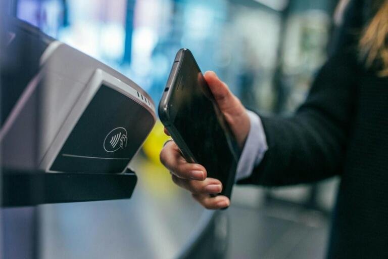 Contactless digital payment at a merchant terminal, not an official UPI announcement