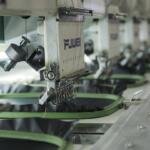 Close-up view of embroidery work and fabric, illustrative stock photo, not a photo of the Surat workers' demonstrations