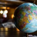 Desk globe illustrating the global economic and trade outlook in 2026