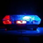 Illustrative photograph of police emergency lights; not a picture of the Surat kidnapping investigation
