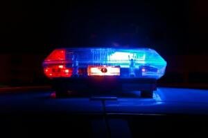 Illustrative photograph of police emergency lights; not a picture of the Surat kidnapping investigation